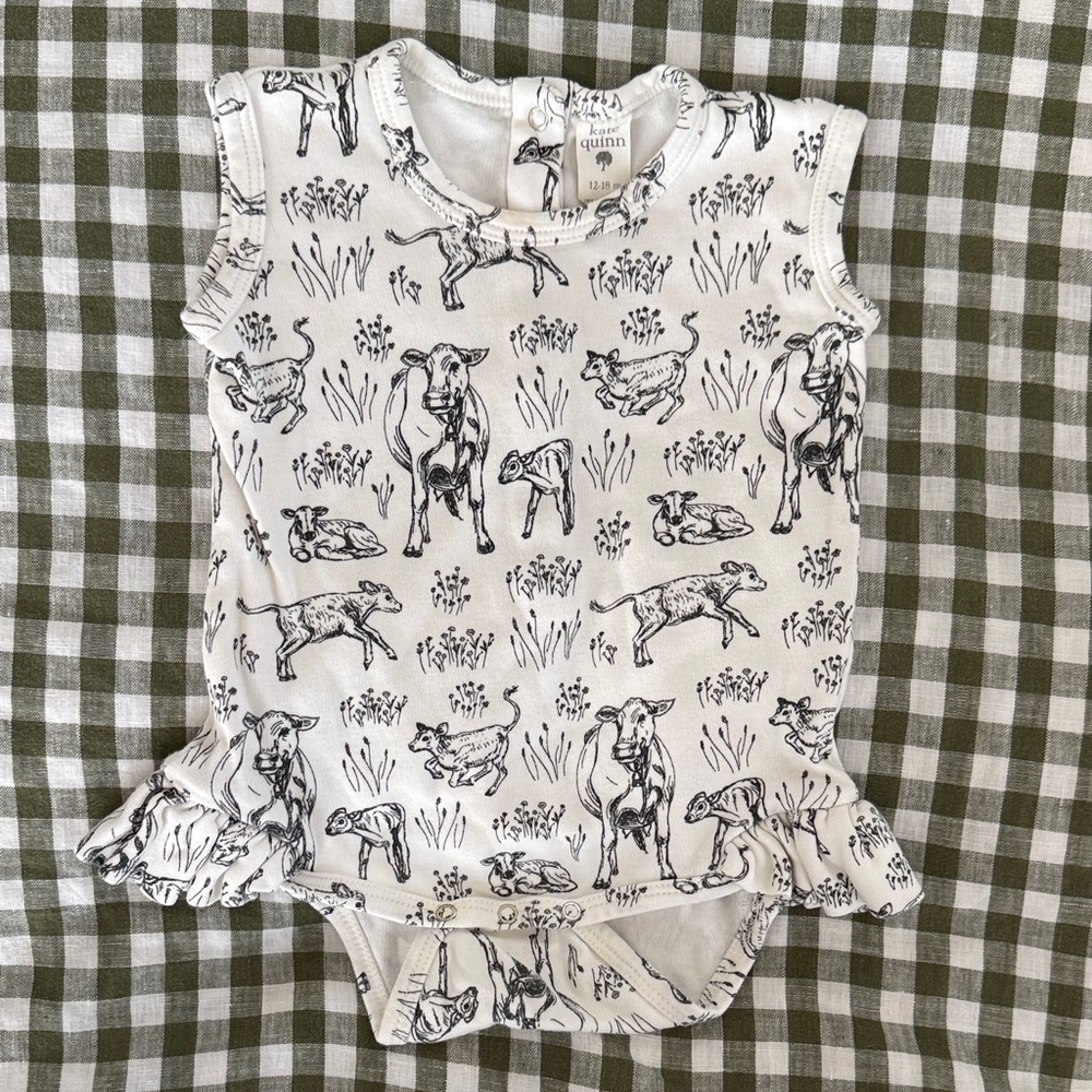 Kate Quinn Sleeveless Ruffle Leg Bodysuit Cotton Interlock Black Cow Pasture